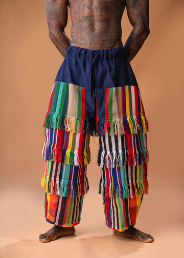 Pantalón curvo de pierna ancha con flecos de Aso Oke