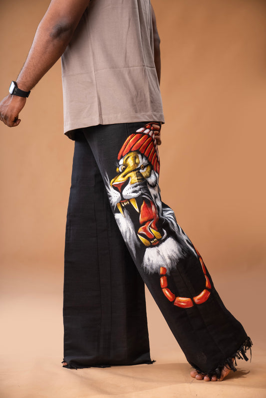 Pantalones de pierna ancha en mezcla de Aso Oke Ft Arte de león igbo pintado a mano