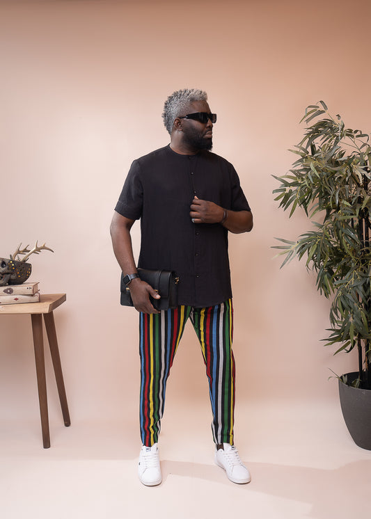 Caftán negro pintado a mano y pantalón aso oke