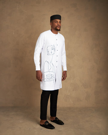 Conjunto de caftán, pantalón y gorra con dibujo de líneas esquemáticas